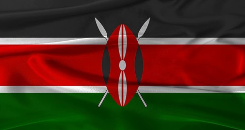 Flag of Kenya with fabric textured background. Close up of National flag of Kenya with realistic