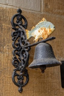Fish figure, bell, Bibury, The Cotswolds, England, Great Britain