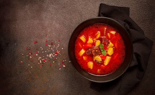 Meat goulash, with potatoes and carrots, sweet pepper, traditional Hungarian soup, homemade, no