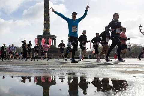 Runners run on the Big Star in front of the Victory Column at the 45th Generali Berlin Half