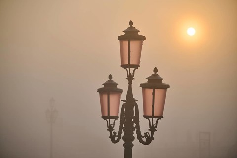 Lanterns at 'Alilaguna' at sunrise in Venice on a foggy morning in winter, Italy
