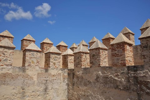Palisades at the Alcazaba, city wall with pinnacles, detail, historic city fortification, landmark,