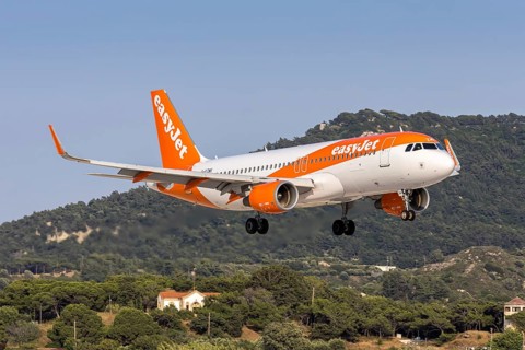 An easyJet Airbus A320 aircraft with the license plate G-EZWK at Rhodes airport, Greece