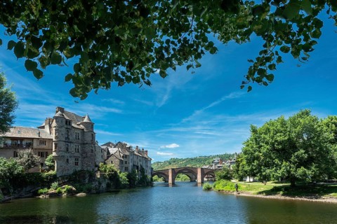 Espalion, Old Palace and 11th century bridge over Lot River Aveyron on Way of St James, Aveyron