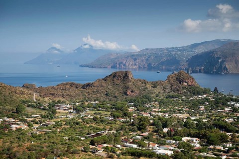 Houses, Vulcano, in the background Lipari and Salina, Aeolian or Lipari Islands, Sicily, Southern