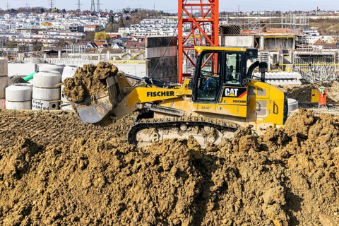 Construction site of the Böckinger Strasse neighbourhood in Zuffenhausen with bulldozer. A total of
