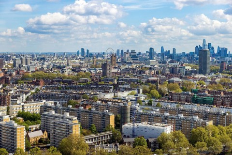 The London skyline stretches from Battersea's terraced streets toward the City, viewed from the