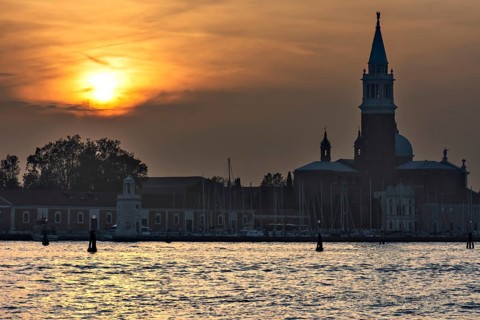 Silhouette of San Giorgio Maggiore church at sunset, Venice, Veneto, Italy