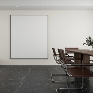 Elegant living room featuring a large blank canvas on the wall, sleek brown chairs, a wooden table,