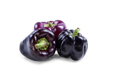 Assortment, purple and black pepper, on a white background, isolate