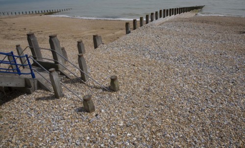 Wooden groyne showing different beach levels, Eastbourne, East Sussex, England, United Kingdom