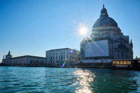 View from a gondola on 'Basilica the Santa Maria della Salute' next to Canal Grande' in Venice on a