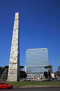 Piazza Guglielmo Marconi and Obelisco di Marconi stele and Unogas Energia Spa building, Esposizione