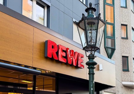 Rewe lettering on a supermarket in Düsseldorf, Germany