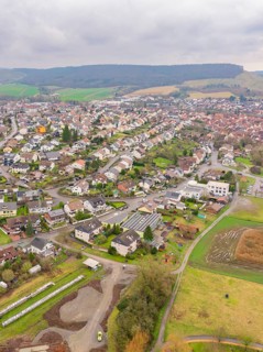 Aerial view of a town with houses, streets and surrounding fields, Großbottwar, Ludwigsburg