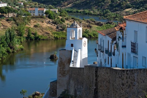 View of the clock tower (Torre do Relógio), which was built into one of the towers of the city