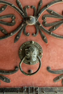 Ebreuil village, bronze door knocker of Saint-Leger benedictine abbey, Allier department,