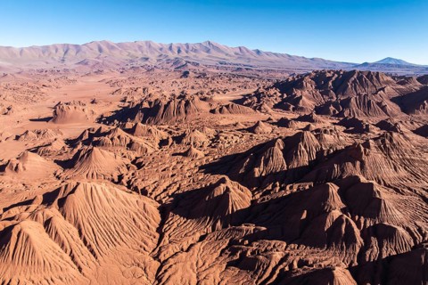 Stunning aerial view of the dramatic, sculpted terrain of Devil's Desert in Salta, Argentina.