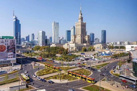 Warsaw skyline skyscrapers with Palace of Culture and trams in the city centre in Warsaw, Poland