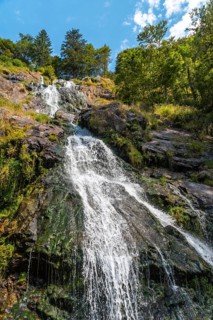 Lots of water in summer at the Todtnau waterfall in the Black Forest in Germany