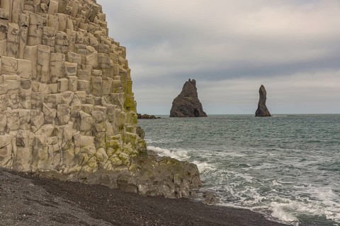 Reynisfjara Beach with Basalt rocks and the rock needles, close to Vik i Myrdal, South Iceland