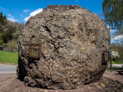 Largest lava bomb exhibited in village Strohn, near Daun, volcanic region, Eifel, Germany