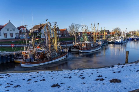 The fishing village of Greetsiel, historic fishing harbour, with the largest shrimp cutter fleet in