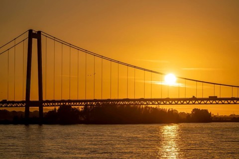 The Emmerich Rhine Bridge, federal road B220, evening light, at 803 m the longest suspension bridge
