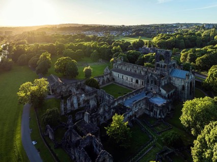 Kirkstall Abbey from a drone, Kirkstall, River Aire, Leeds, West Yorkshire, England, United Kingdom