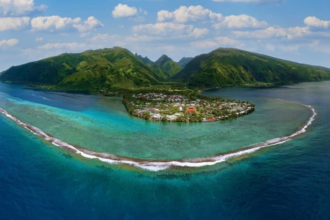 Aerial view, panorama, fringing reef in front, beach village Taurita behind, Tai'arapu-Est