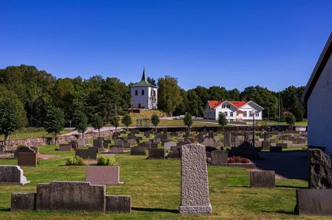 Free-standing bell tower from 1673 and cemetery of Skee kyrka, a church dating back to the 12th