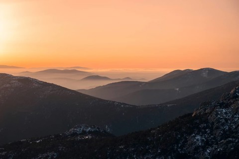 Capture of a serene, snow-dusted landscape at Siete Picos in Guadarrama Mountains, Madrid. The