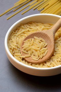 Semi di Orzo, Italian pasta in the form of barley grains, and spaghetti, pasta from Italy