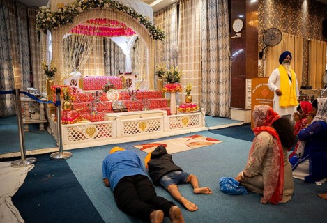 Sikh devotees offer prayers at a Gurudwara on the occasion of Guru Nanak Jayanti, in Guwahati,