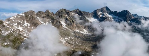 Mountain landscape with clouds of fog, Valais, Switzerland