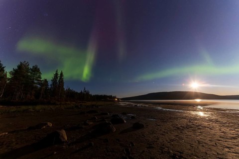 Northern lights, (Aurora borealis) at a lake near Kiruna, September 2024, Lapland, Sweden