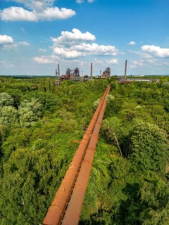 The Duisburg Nord Landscape Park, double blast furnace gas pipeline from the west View across the
