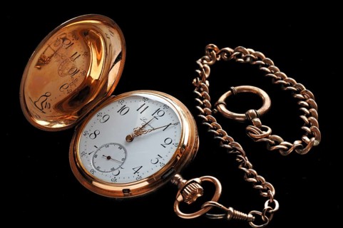 Longines 19th century gold-plated pocket watch with chain on black velvet, Germany