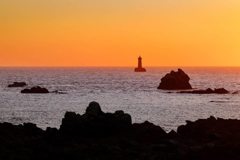 Sunset at the Phare du Fourb on the Atlantic coast near Porspoder, Bretgane, France