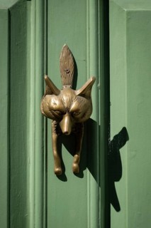 Light green, coffered door with fox shaped brass door knocker and house number 33, Chelsea, London,