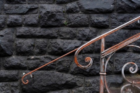 Detail of a banister to the parish church, St Peter, Villnöß, Funes, Villnößtal, South Tyrol, Italy