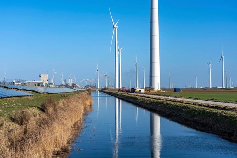 Wind farm on the Slaperdijk dike near Eemshaven, on which dikes are, as a test project, 17000 solar