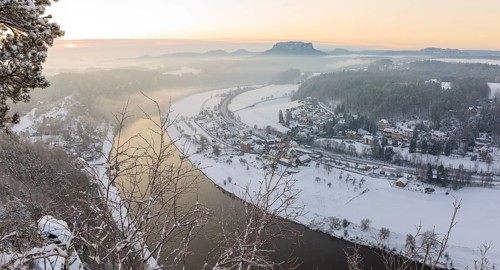View from the Bastei into the Elbe valley with the spa town of Rathen and table mountains such as