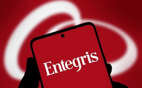 entegris logo is displayed on smartphone. Entegris, Inc. is a supplier of materials for the