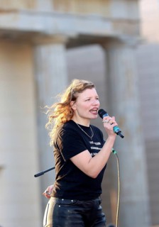 Luisa-Céline Gaffron speaks at the demonstration Against Sexualized Digital Violence - Solidarity