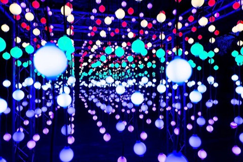 Light, glowing balls, LED lamps, hang in series, side by side, on top of each other, change their