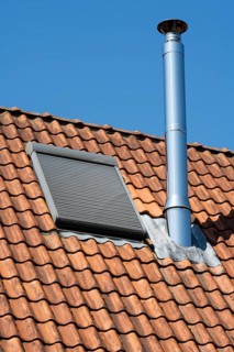 Detail of a house roof, window with closed shutters, ventilation pipe, detail, sky, Westphalia,