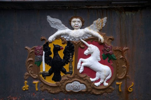 Black eagle and unicorn in the coat of arms of the imperial city on Marktbrunnen, Schwäbisch Gmünd,