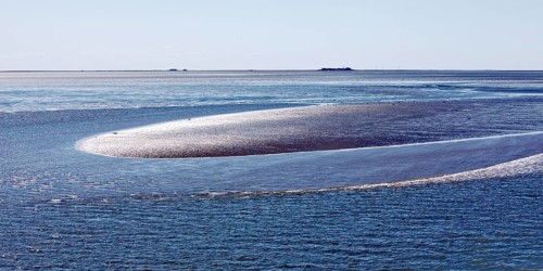 Schleswig-Holstein Wadden Sea National Park on the crossing from Föhr to Dagebüll at low tide,