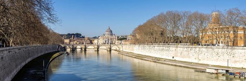 Rome skyline with St Peter's Basilica in the Vatican Panorama Ponte Sant'Angelo bridge over the